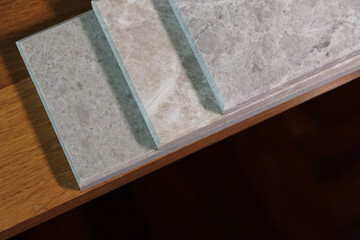Top view of color samples marble  on oak wood table