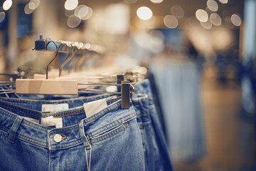 Jeans on the hanger in the store. Shopping in store.