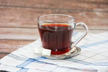 traditional black tea in a glass mug