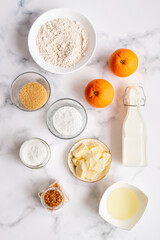 Home made baked whole wheat vegan donuts with orange glaze