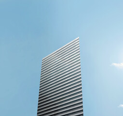 Single office building exterior during a bright sunny day