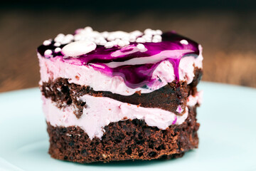 blueberry-flavored cake covered with blueberry jam