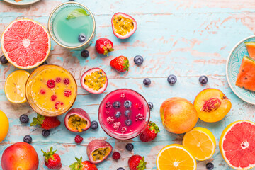 Variation of smoothies and refreshing drinks with fresh fruits for hot summer