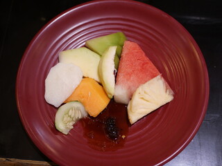 Rujak is a typical Indonesian dish consisting of sliced ​​fruit and sauce