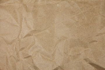 Old torn crumpled paper bag texture background.