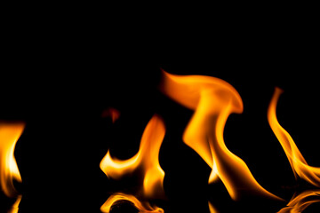 Fototapeta premium Fire flames on black background.