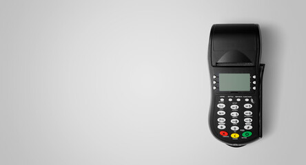 Payment terminal POS on the gray background with copy space, including clipping path