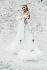 Fototapeta na wymiar Beautiful wedding bride day outdoors at ocean beach. Happy marriage couple o