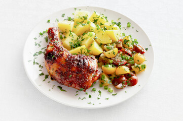 Roasted chicken leg with boiled potato