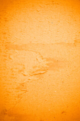 Torn orange paper recycling cardboard texture.