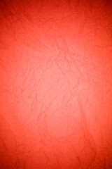Crumpled red paper background.