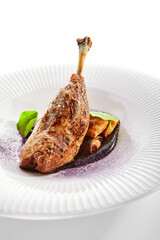 Duck leg with pancakes and berry sauce