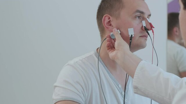 Patient nerves testing using electromyography at medical center