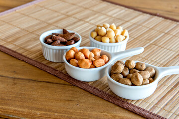 Healthy snack, beans, chickpeas, peanuts and almonds.