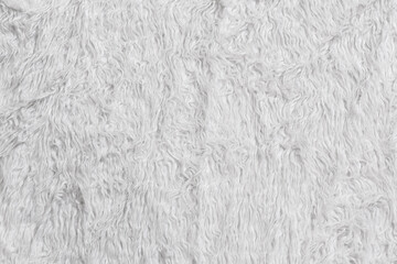 White furry fabric decorated the background.