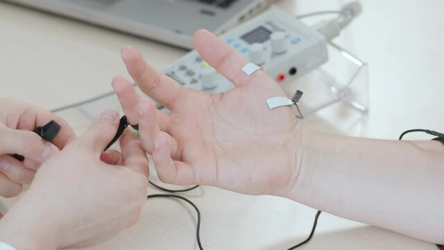 Patient nerves testing using electromyography at medical center