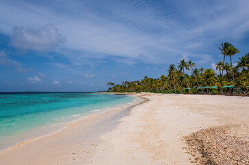 Untouched lonely tropical beach in Maldives Crossroads. July 2021