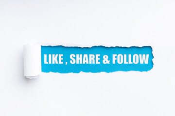 torn paper revealing the text: like, share & follow