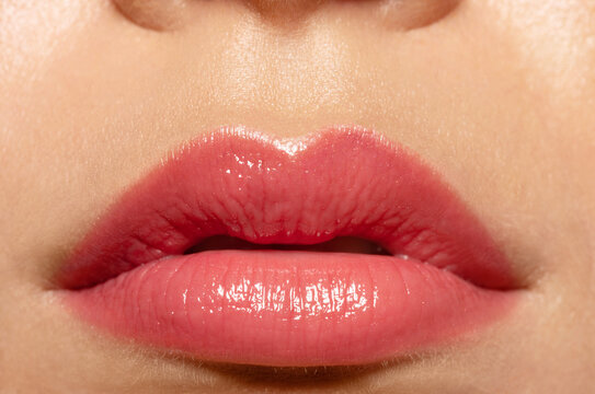 Close up beautiful female lips with natural make up