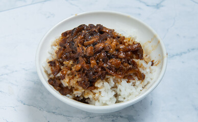 braised pork on rice is Minced pork served with pickles on top of steamed rice, taiwan food