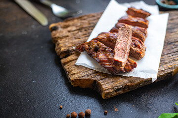 steak grill meat beef bbq veal grilled barbecue on the table, healthy meal snack copy space food background keto or paleo diet