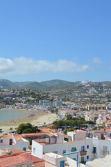 Fototapeta na wymiar Peñiscola town landscape view, it's south beach coastline and mountains