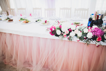 Interior of a restaurant prepared for wedding ceremony