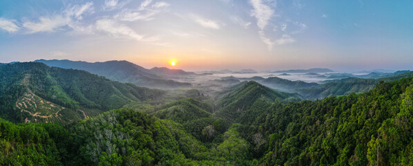 Panorama Nature Landscape Sunset or sunrise Over mountain and misty. Nature and travel concept.