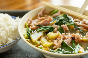 angle view fast food of spicy boiled pork with rice horizontal composition