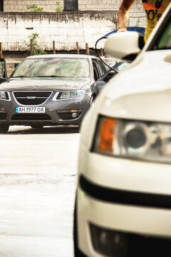 Chernigov, Ukraine - July 24, 2021: Saab car at a car wash in front of another Saab car. White Saab 9-3 and Saab 9-5