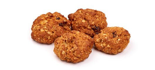 Homemade oat cookies with raisins, isolated on white background.