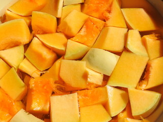beautiful fresh vegetables, chopped pieces of orange pumpkin using in potjiekos 
