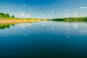 Fototapeta premium Summer Landscape With Narew River And Clouds On The Blue Sky