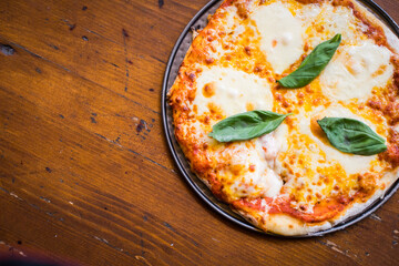 Pizza on a wooden table
