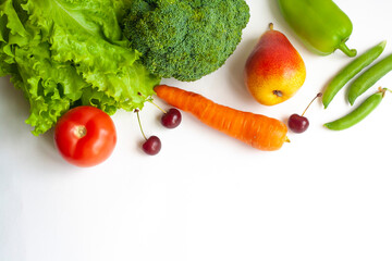 Vegetables and fruits on a white background, flat lay, copy space