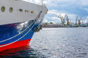 Cargo ship in the port, logistics and transportation of goods by sea.