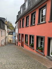 Fototapeta na wymiar Saabburg, Germany May 25, 2020. The old streets of Zaabburg are special with their slopes. The architecture of this old city harmoniously merged modern and medieval buildings. 