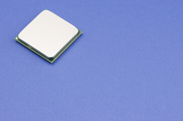 High angle shot of a small mirror on a blue surface