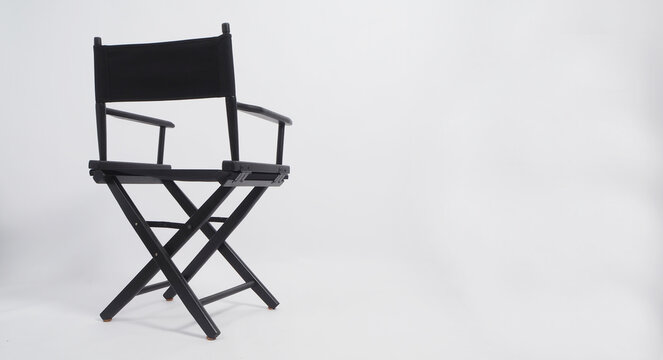 Sight Back Of Black Director Chair Use In Video Production Or Movie Industry On White Background.