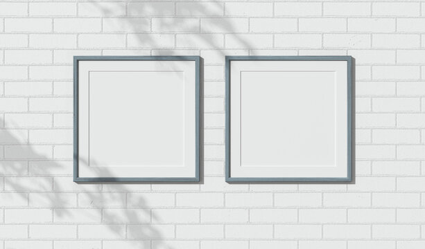Two wooden frames on white brick wall. Triptych. 3D render wooden painted frame mock up. Empty interior. 3D design interior. Template for business. Passe partout frame. Blank. Shadow on the brick wall