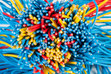 Group of colored electric cables closeup