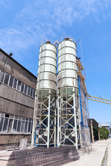 silo cans for cement storage at the concrete mixing unit