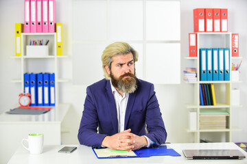 concentrated on work. erp consultant making notes. company executive working with documents. mature...