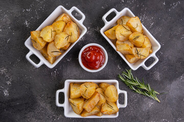 bowl of rustic fried and roasted potatoes with rosemary