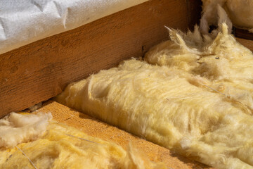 close-up of roof rafters and stone wool insulation