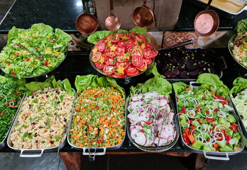 Self-service salad buffet with a variety of products