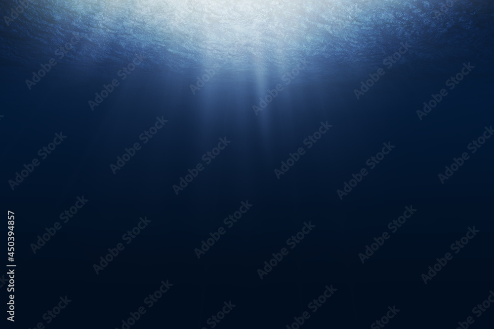 Poster dark blue ocean surface seen from underwater. abstract waves underwater and rays of sunlight shining