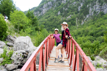Traveling mother and daughter in the mountains of albania