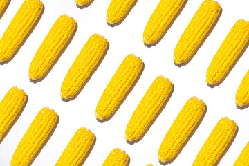 Corn on a white background. Selective focus. Pattern