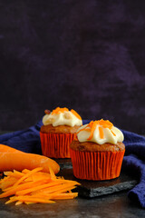 carrot cakes in close-up on a dark background